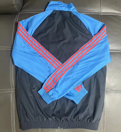 Casaco azul e preto 2026/27 fecho completo